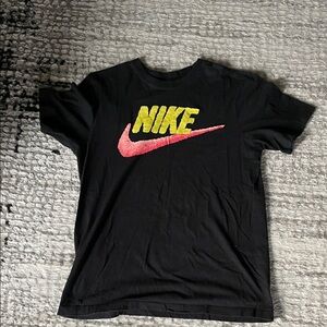 Nike Black Tee with Vibrant Yellow and Pink Swoosh